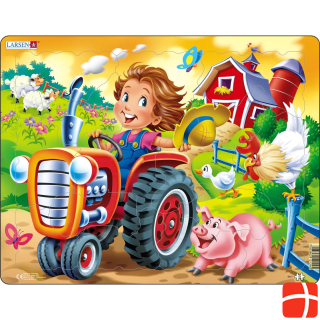 Larsen Farm boy with tractor